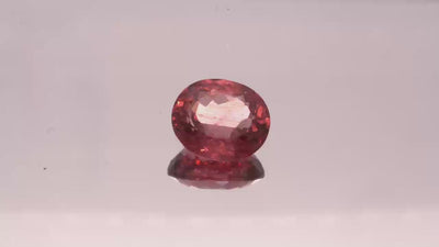Natural Red Apatite 3.96 carats, oval cut, light orangy red gemstone, untreated