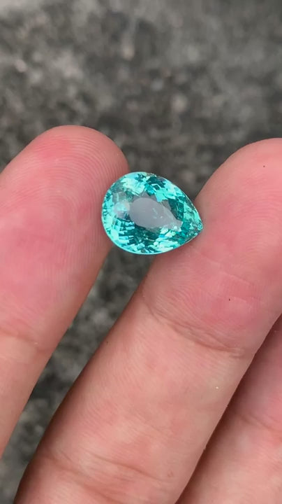 Natural Paraiba tourmaline, 6.55 carats, pear cut, faceted, greenish-blue Paraiba color, Mozambique origin, GRS certified