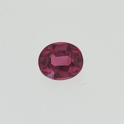 Natural pyrope-almandine garnet, 1.05 carats, oval cut, slightly orangy red color, transparent, ČGL certified gemstone