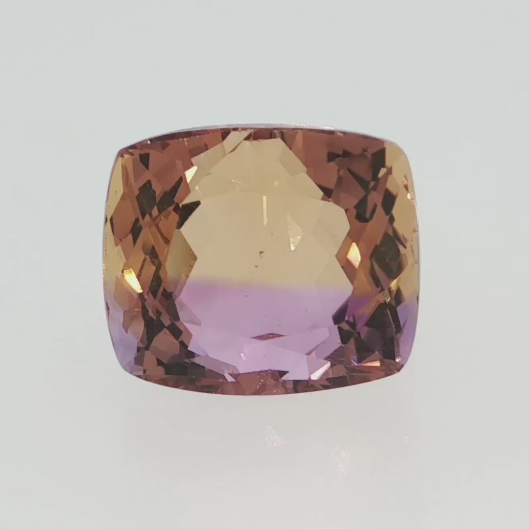 Natural ametrine quartz, 13.20 carats, cushion cut, transparent clarity, violetish purple and orangy yellow, ČGL certified