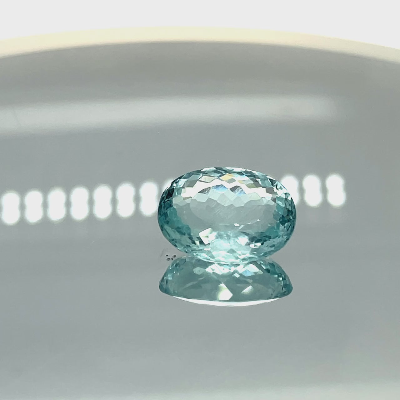 Natural aquamarine, 10.68 carats, roundish oval cut, untreated, vivid blue