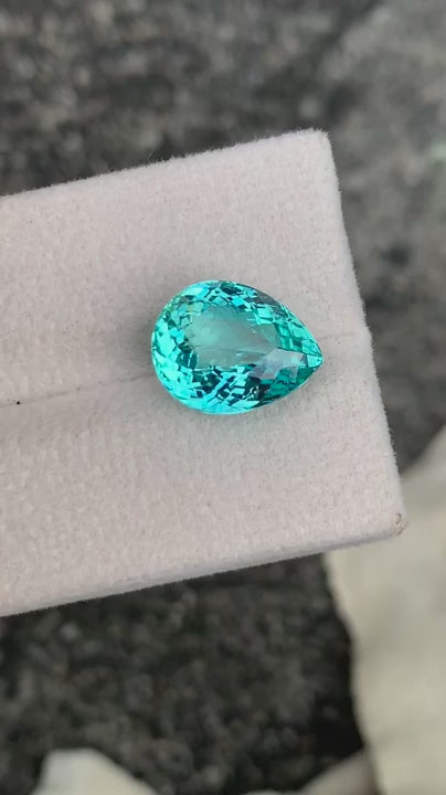 Natural Paraiba tourmaline, 6.55 carats, pear cut, faceted, greenish-blue Paraiba color, Mozambique origin, GRS certified