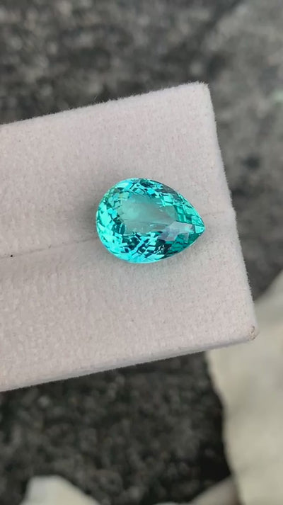 Natural Paraiba tourmaline, 6.55 carats, pear cut, faceted, greenish-blue Paraiba color, Mozambique origin, GRS certified