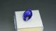 Natural tanzanite, 7.58 carats, purplish-blue color, cushion cut, heat-treated, collectible gemstone