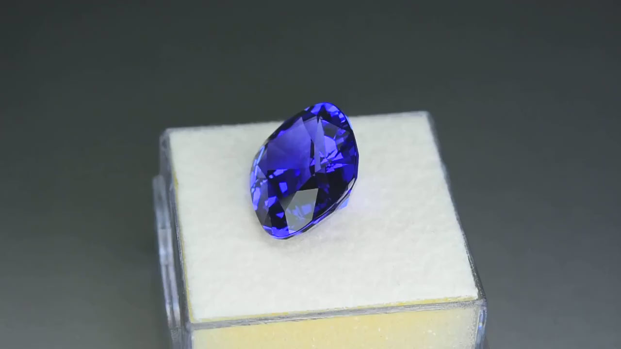 Natural tanzanite, 7.58 carats, purplish-blue color, cushion cut, heat-treated, collectible gemstone