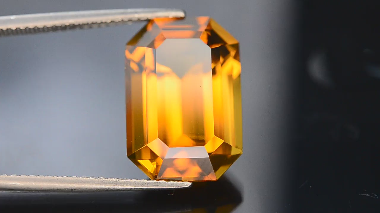 Natural citrine, 9.80 carats, octagonal cut, eye-clean clarity, heated, yellow color, origin Uruguay