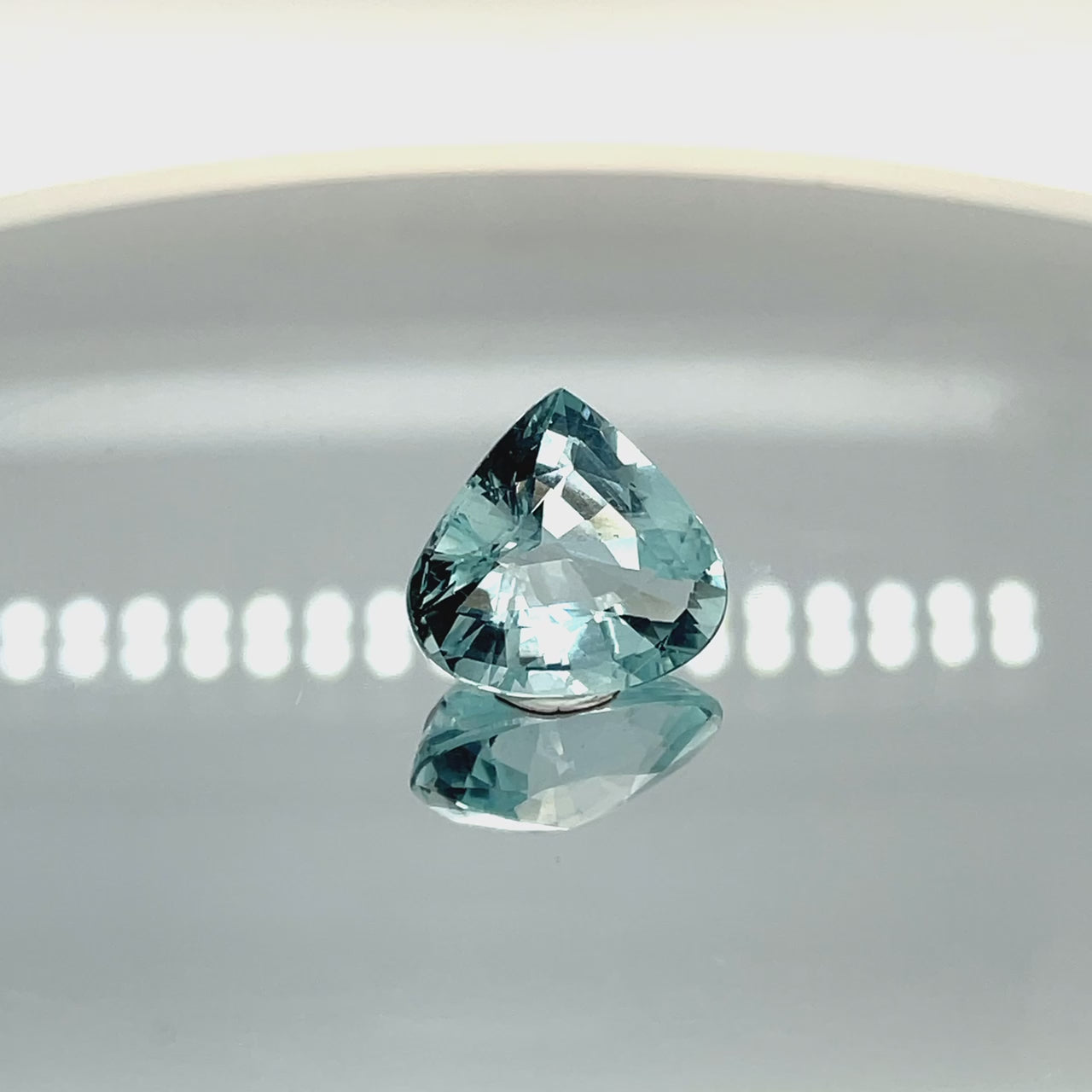 Natural aquamarine, 9.57 carats, pear cut, eye clean clarity, untreated, vivid blue