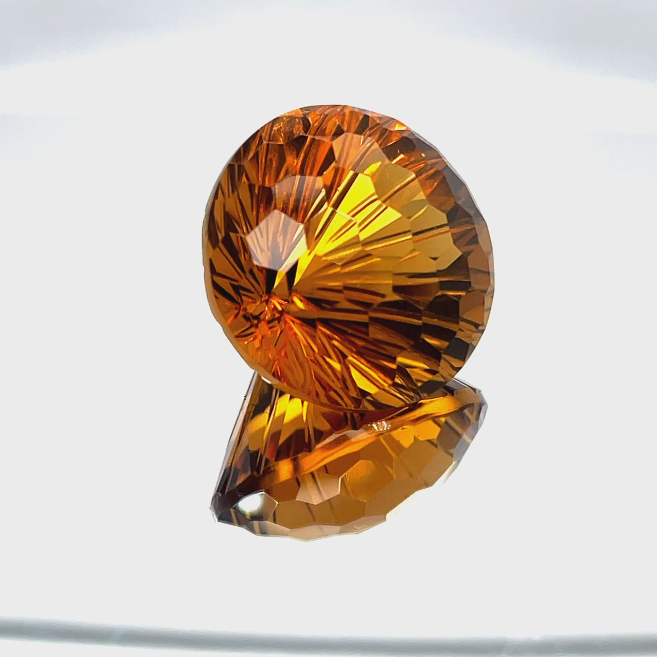 Natural honey citrine, 38.37 carats, round honeycomb cut, IF clarity, untreated, honey-orange color