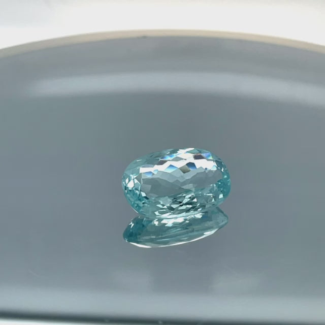 Natural aquamarine, 11.06 carats, oval cut, eye clean clarity, untreated, vivid blue