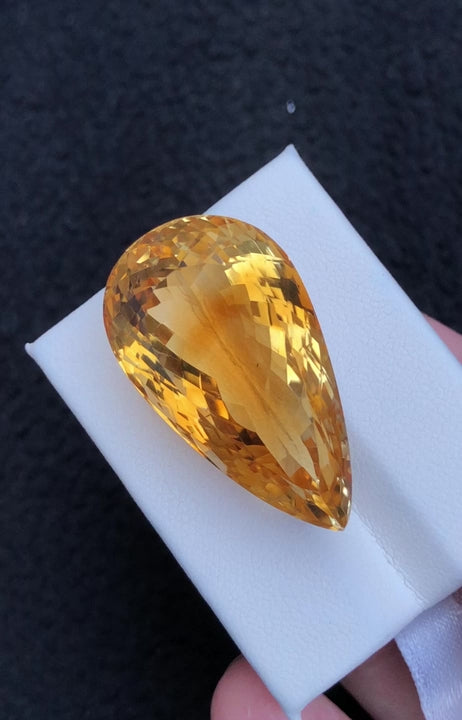 Natural citrine, 55.70 carats, pear faceted cut, untreated, golden-yellow color