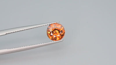 Natural orange zircon, 2.00 carats, round brilliant cut, VS clarity, untreated