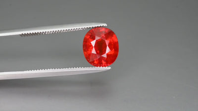 Natural spessartite garnet, 2.60 carats, oval cut, I clarity, untreated, red gemstone