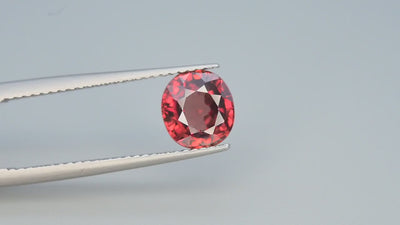 Natural red zircon, 2.50 carats, oval cut, VVS clarity, untreated, with warm undertones