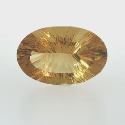Natural citrine, 88.94 carats, oval cut, clarity: eye clean, lime yellow color