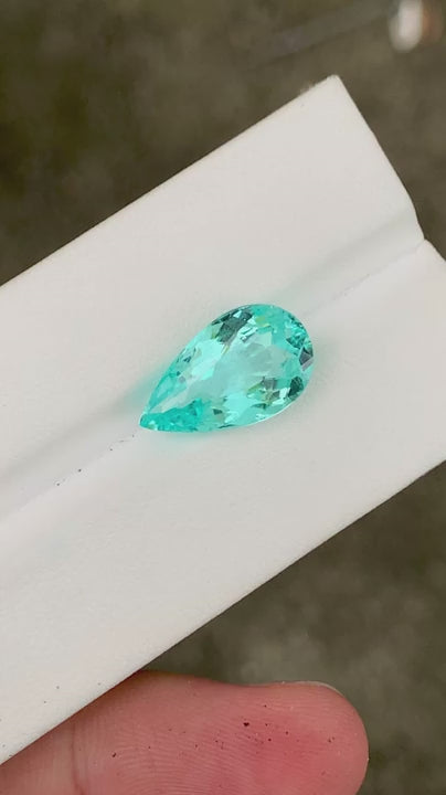 Natural Paraiba tourmaline, 7.60 carats, pear cut, VS clarity, untreated, GIA certified, neon blue-green