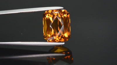 Natural citrine, 7.41 carats, octagon cut, VVS clarity, heated, reddish / orange