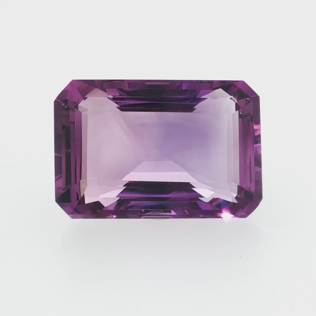 Natural amethyst, 48.46 carats, emerald cut, clarity: eye clean, purple color, measuring 28.08 × 18.83 × 12.63 mm