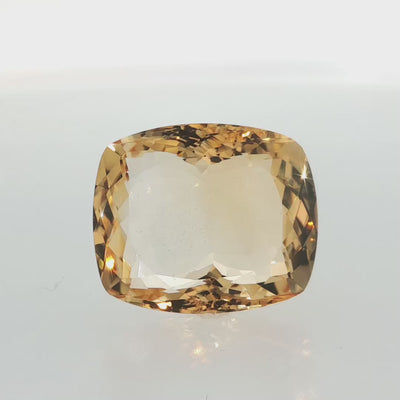 Natural citrine, 43.10 carats, cushion cut, clarity: eye clean, golden-yellow color, measuring 25.49 × 21.65 × 11.97 mm