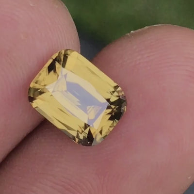 Natural greenish yellow zircon, 3.20 carats, cushion cut, VVS clarity, untreated, from Sri Lanka