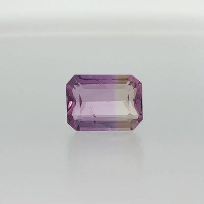 Natural untreated ametrine, 8.24 carats, emerald cut, clarity: slightly included, purple and golden yellow bi-color quartz, measuring 14.26 × 10.59 × 6.73 mm