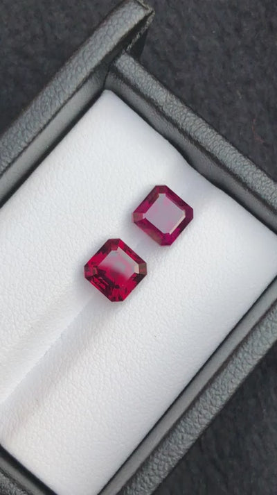 Natural almandine garnets, 4.85 carats total, Asscher cut, VS clarity, untreated, pinkish red, matching pair