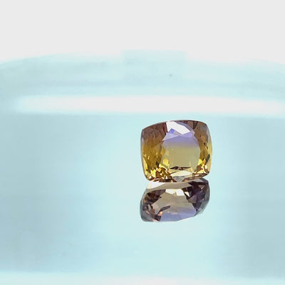 Natural Ametrine 13.20 carats, cushion cut, bicolor light violet and orange-yellow gemstone, untreated