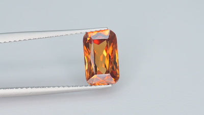 Natural whiskey honey brown zircon, 3.25 carats, rectangular step cut, VVS clarity, untreated, golden-brown hue