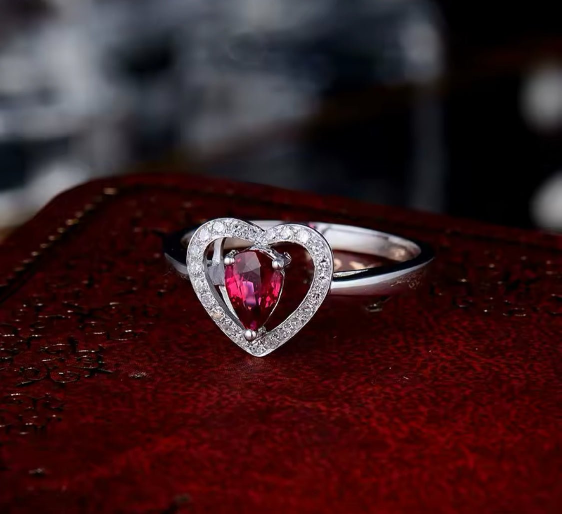 18K white gold ruby diamond ring with 0.55 carat natural pear cut ruby and diamond halo heart design