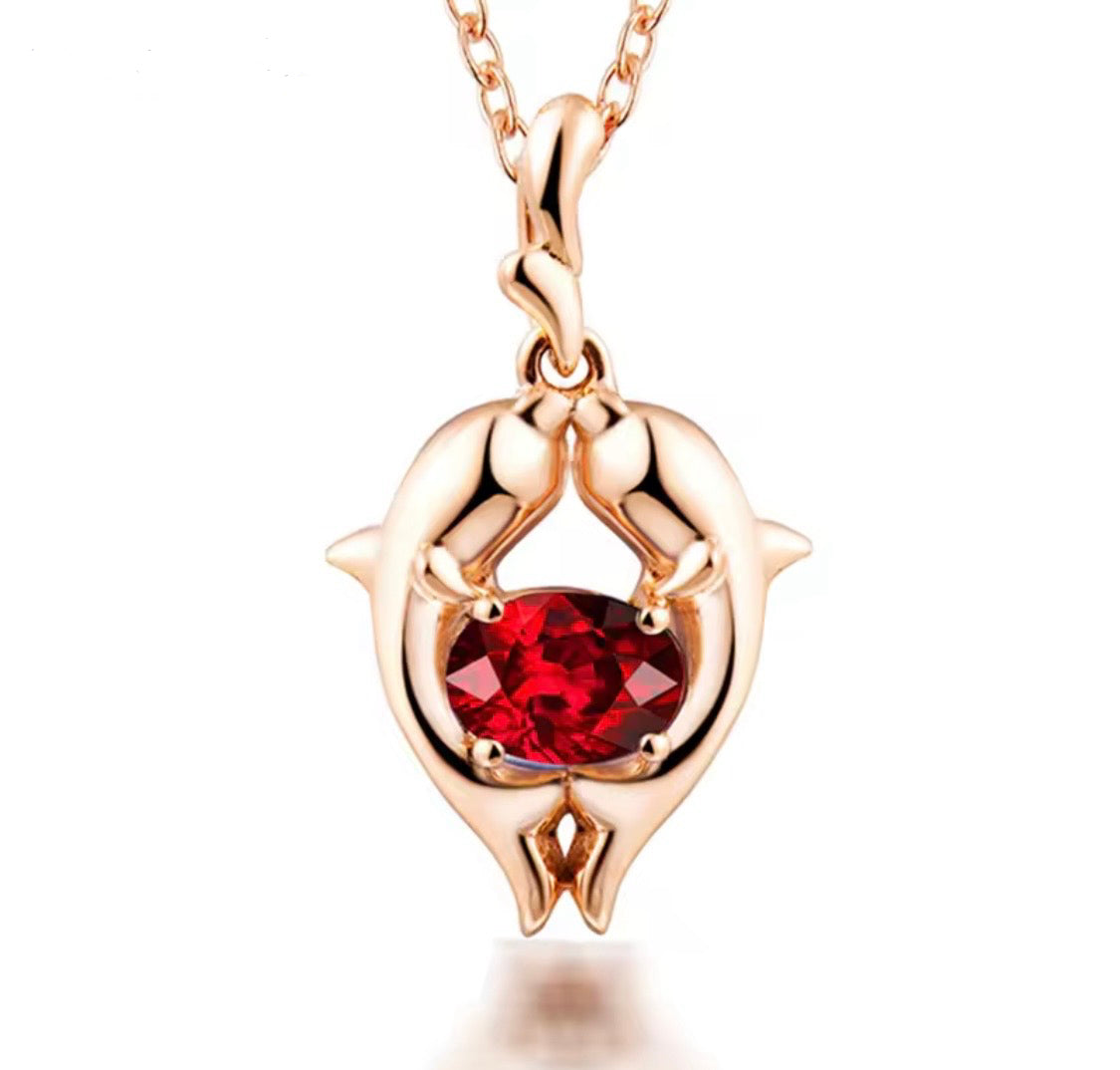 18K rose gold ruby pendant with Pisces zodiac dolphin design and 0.33 carat gemstone