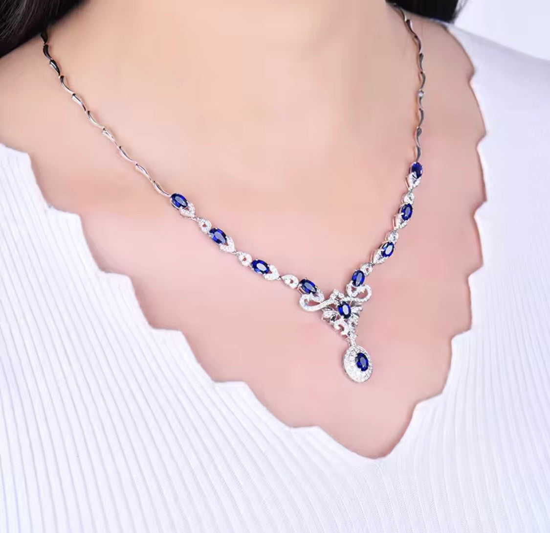 18K gold sapphire diamond necklace with 5.68 carat natural sapphires and cascading elegant design