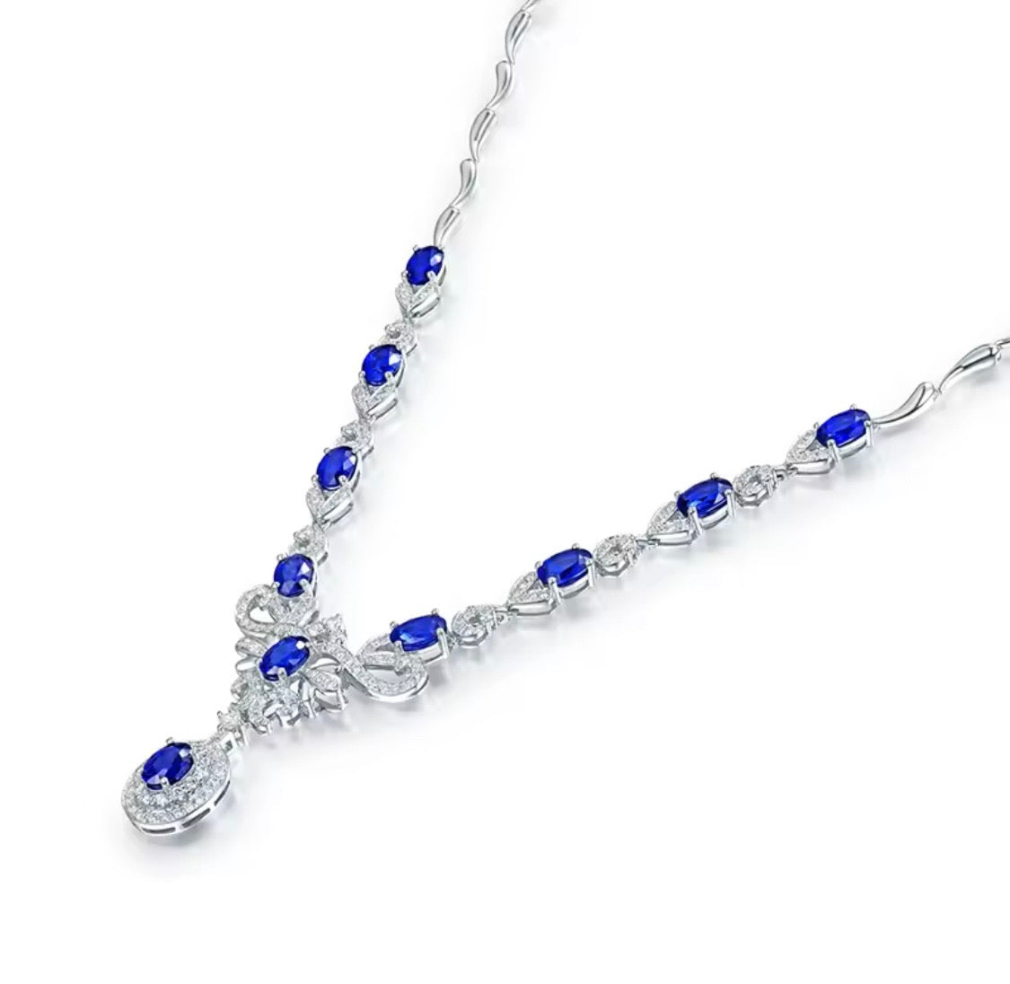 18K gold sapphire diamond necklace with 5.68 carat natural sapphires and cascading elegant design