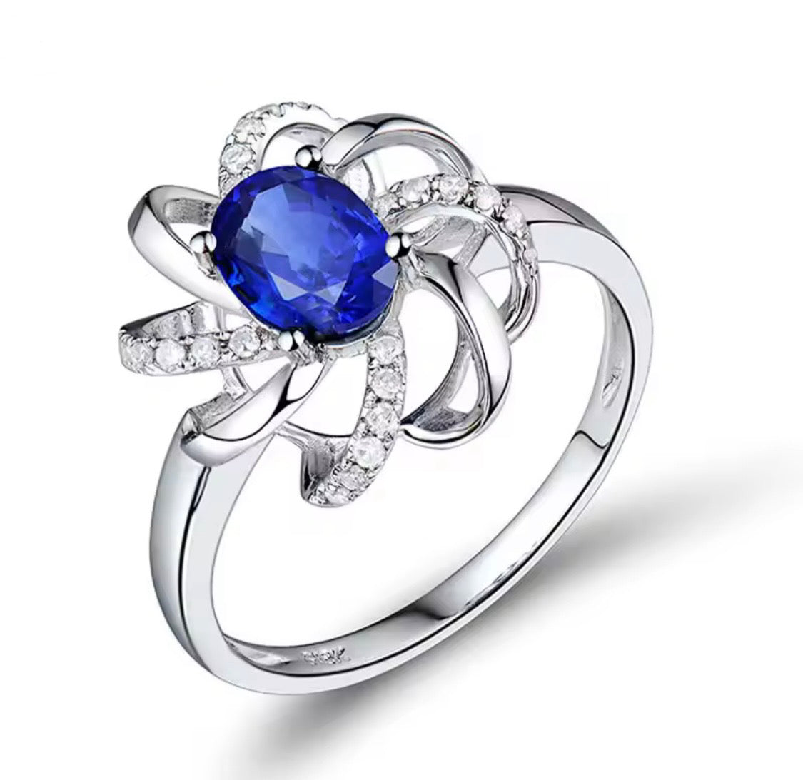 18K white gold sapphire diamond ring with oval natural sapphire and intertwined halo design