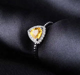 Silver ring with 0.73 ct natural citrine, trillion cut, golden-yellow gemstone, very good clarity, modern handcrafted jewelry