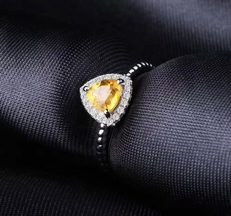 Silver ring with 0.73 ct natural citrine, trillion cut, golden-yellow gemstone, very good clarity, modern handcrafted jewelry