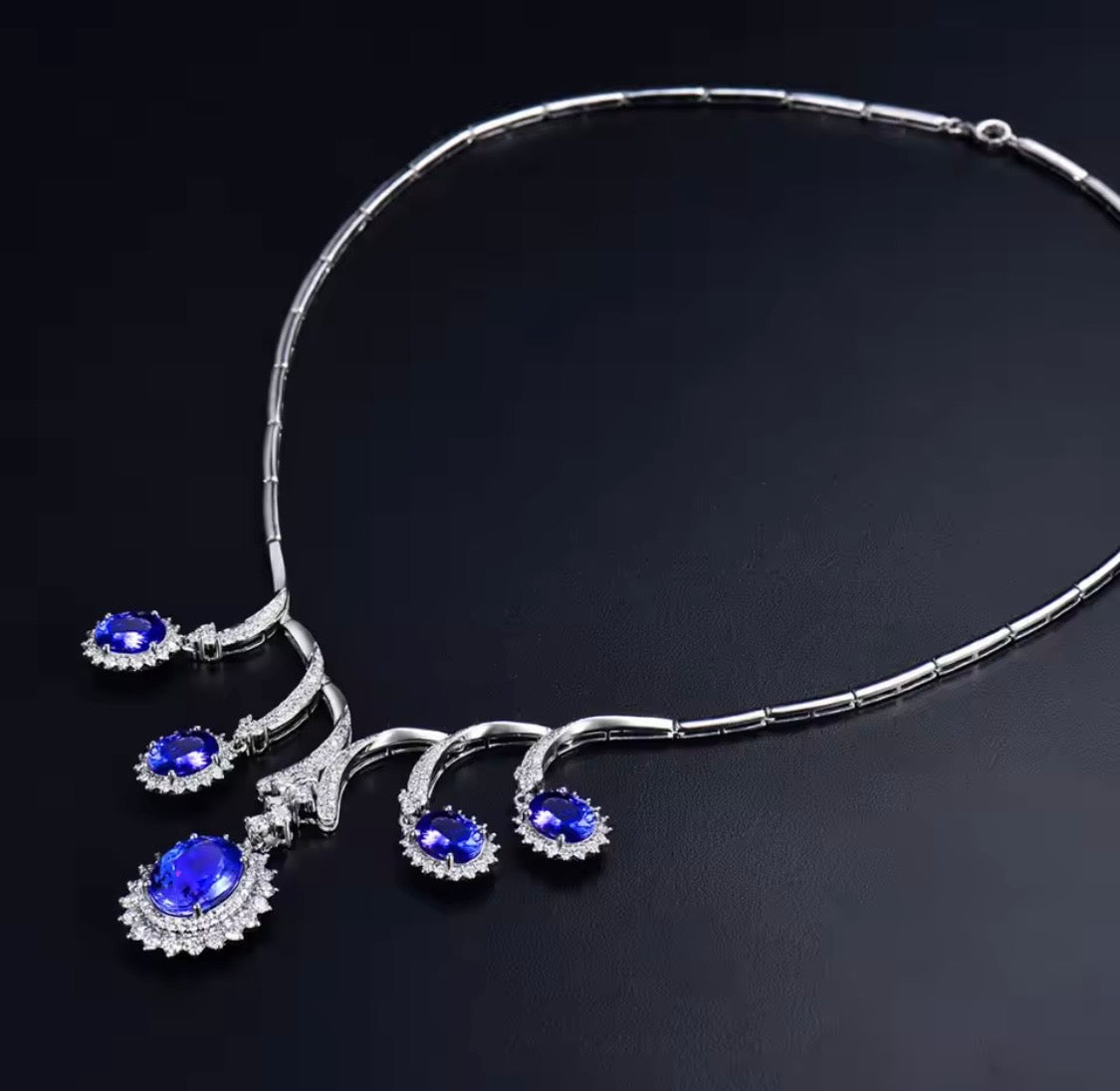 18K gold tanzanite diamond necklace with 12.95 carat natural tanzanite and cascading luxury design