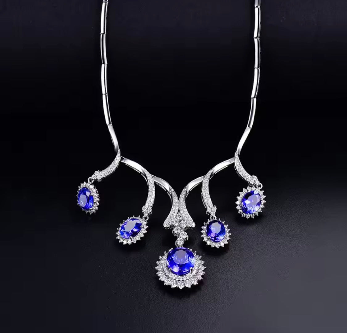 18K gold tanzanite diamond necklace with 12.95 carat natural tanzanite and cascading luxury design