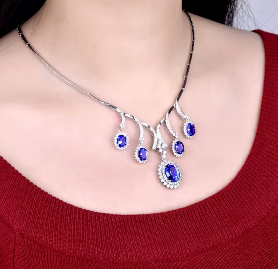 18K gold tanzanite diamond necklace with 12.95 carat natural tanzanite and cascading luxury design