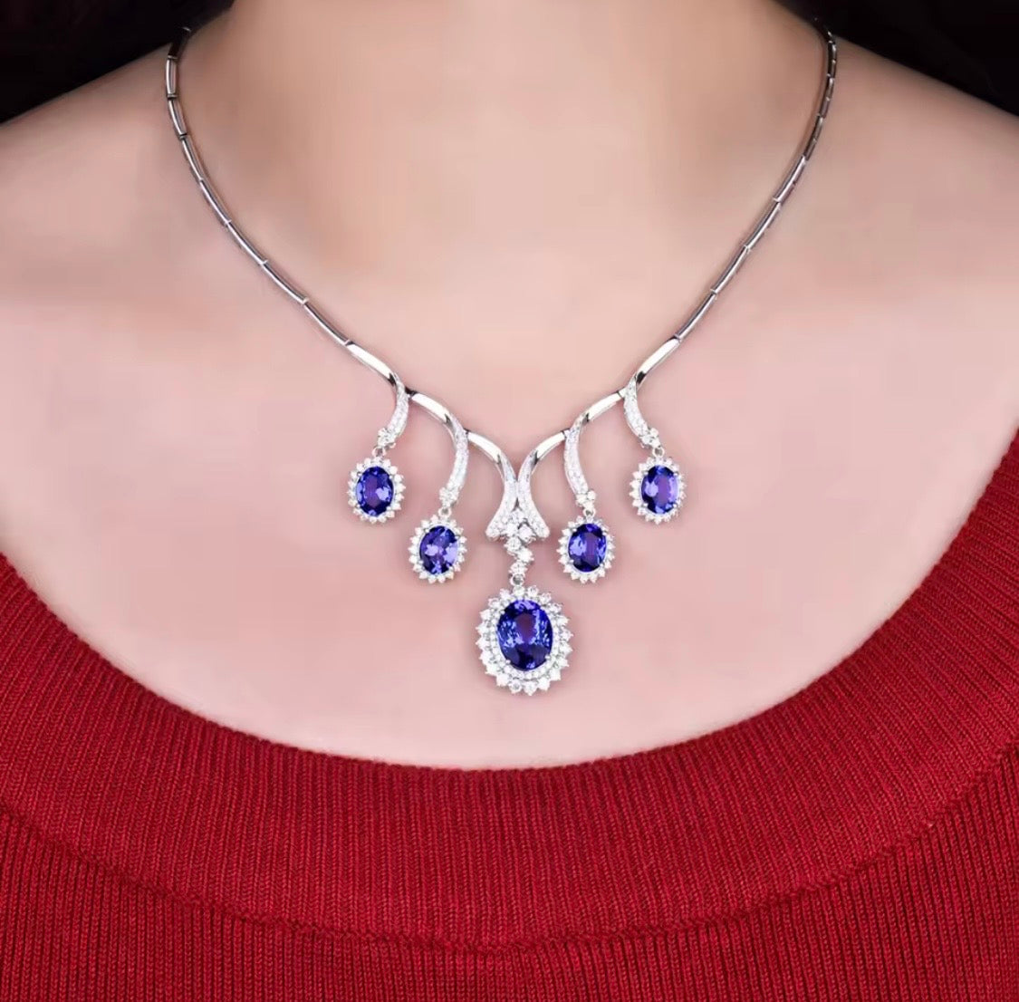 18K gold tanzanite diamond necklace with 12.95 carat natural tanzanite and cascading luxury design