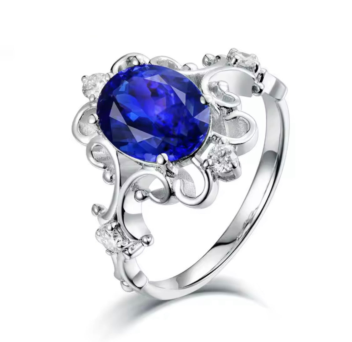 14K white gold tanzanite diamond ring with 1.70 carat oval natural tanzanite princess style design