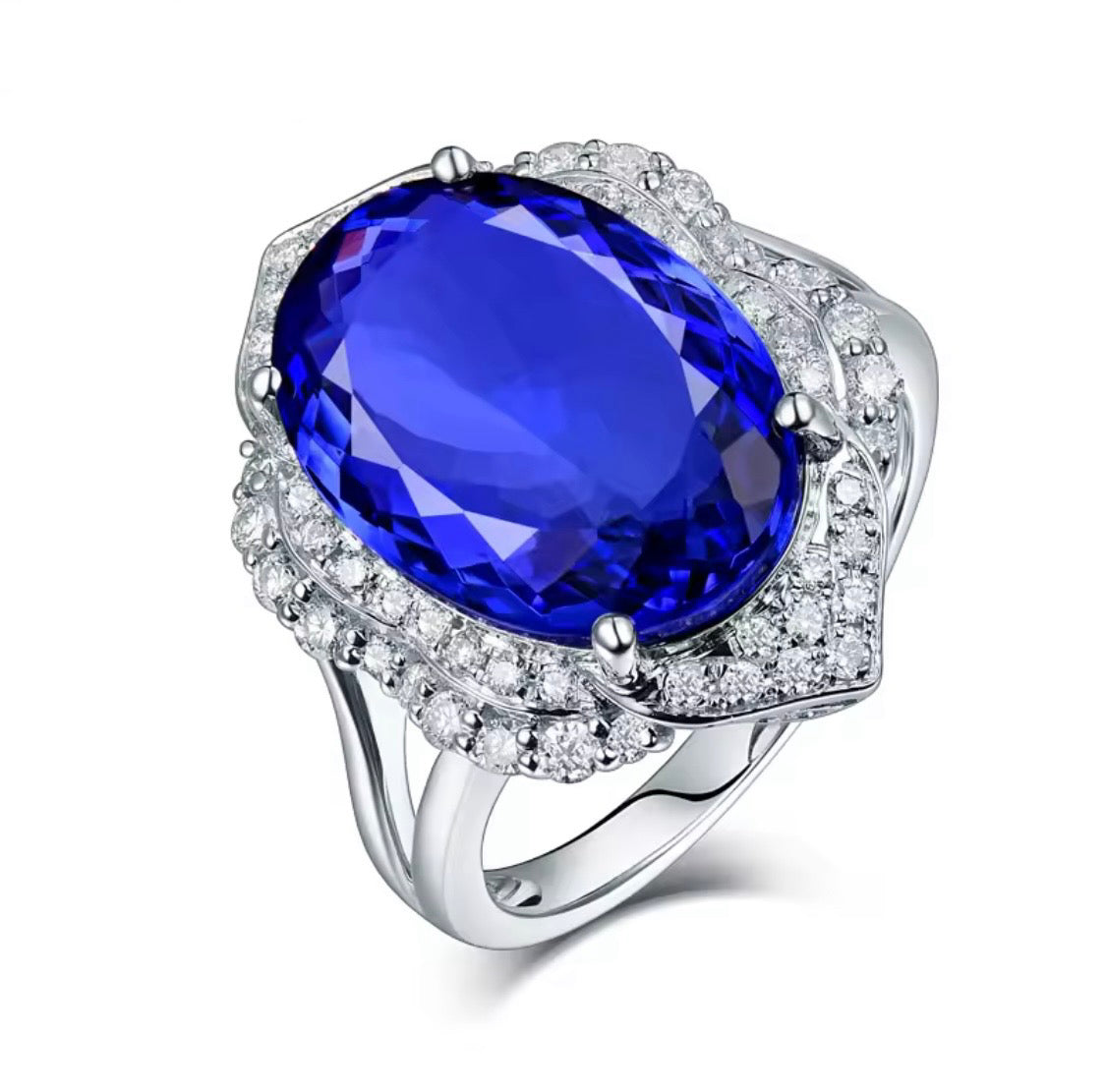 18K white gold tanzanite diamond ring with 8.45 carat oval natural tanzanite and diamond halo unisex
