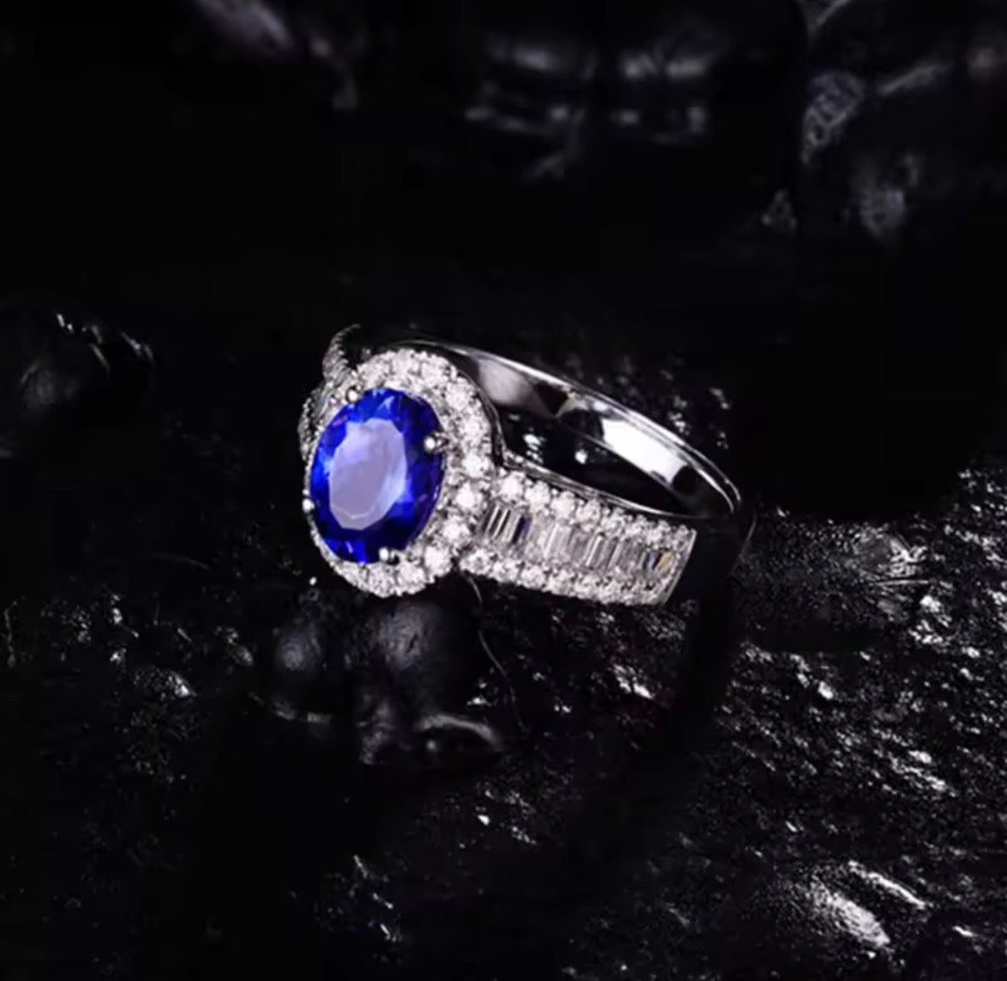 18K gold tanzanite engagement ring with 1.18 carat oval natural tanzanite and diamond halo available in white rose and yellow gold