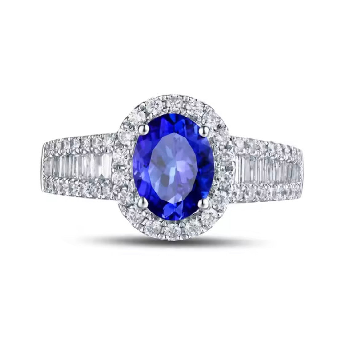 18K gold tanzanite engagement ring with 1.18 carat oval natural tanzanite and diamond halo available in white rose and yellow gold