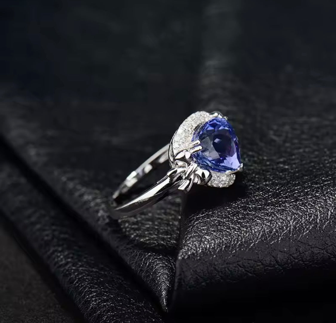 14K white gold tanzanite engagement ring with 2.01 carat pear cut natural tanzanite and diamond halo