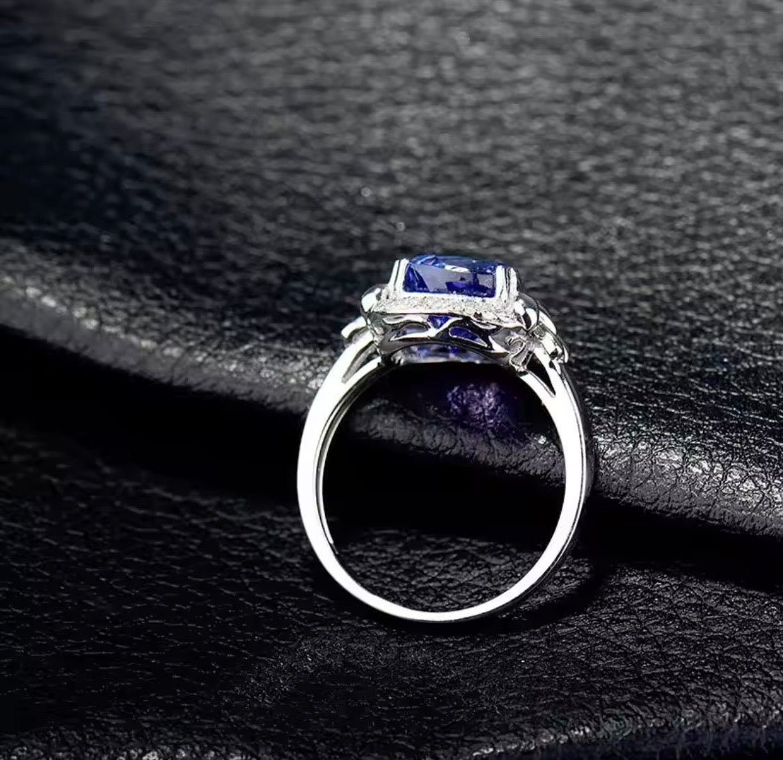 14K white gold tanzanite engagement ring with 2.01 carat pear cut natural tanzanite and diamond halo