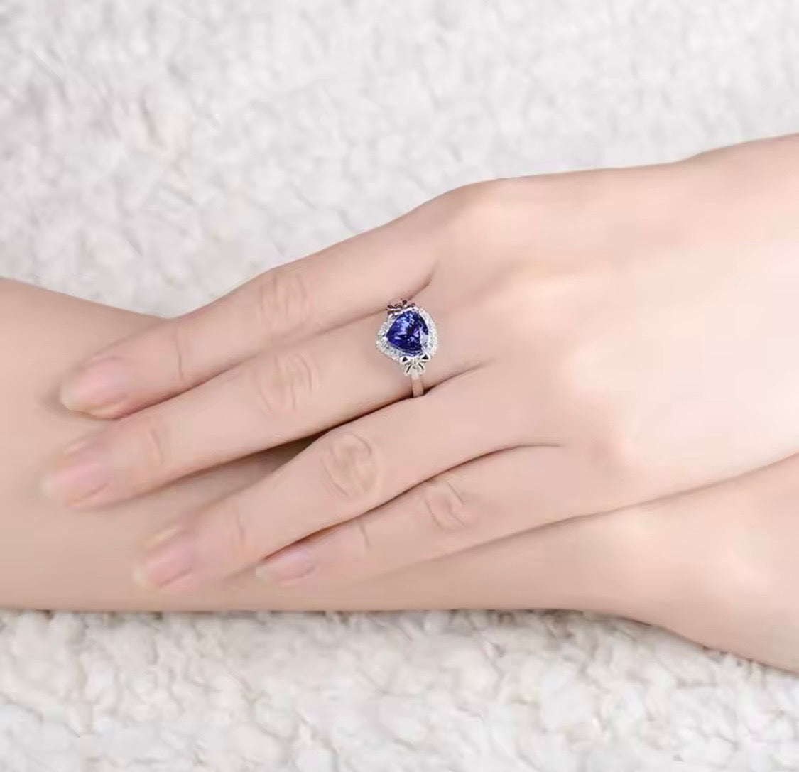 14K white gold tanzanite engagement ring with 2.01 carat pear cut natural tanzanite and diamond halo