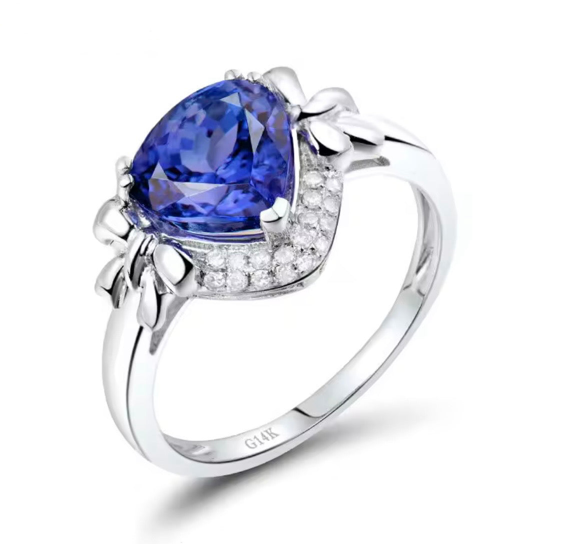 14K white gold tanzanite engagement ring with 2.01 carat pear cut natural tanzanite and diamond halo