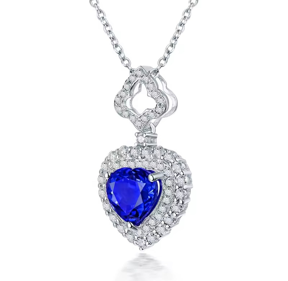 14K gold tanzanite heart pendant with 1.63 carat gemstone and diamond halo