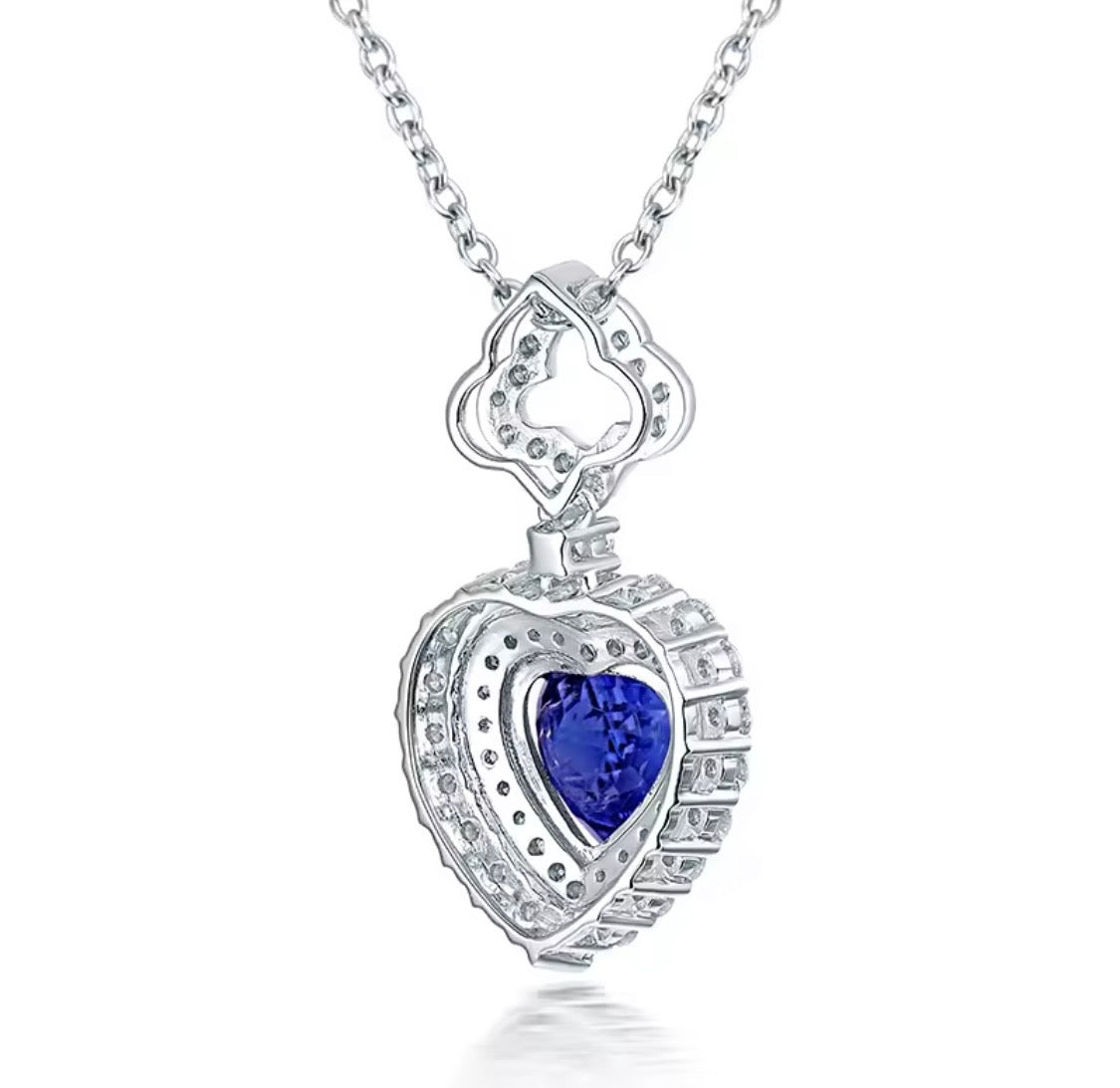 14K gold tanzanite heart pendant with 1.63 carat gemstone and diamond halo