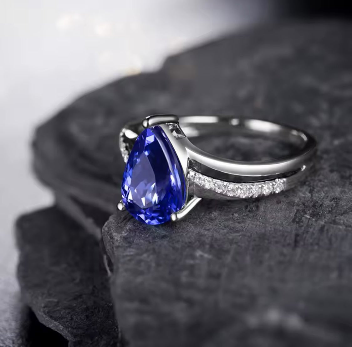 18K white gold tanzanite ring, 2.25 carat natural pear cut tanzanite, very good clarity, diamond accents, luxury fine jewelry
