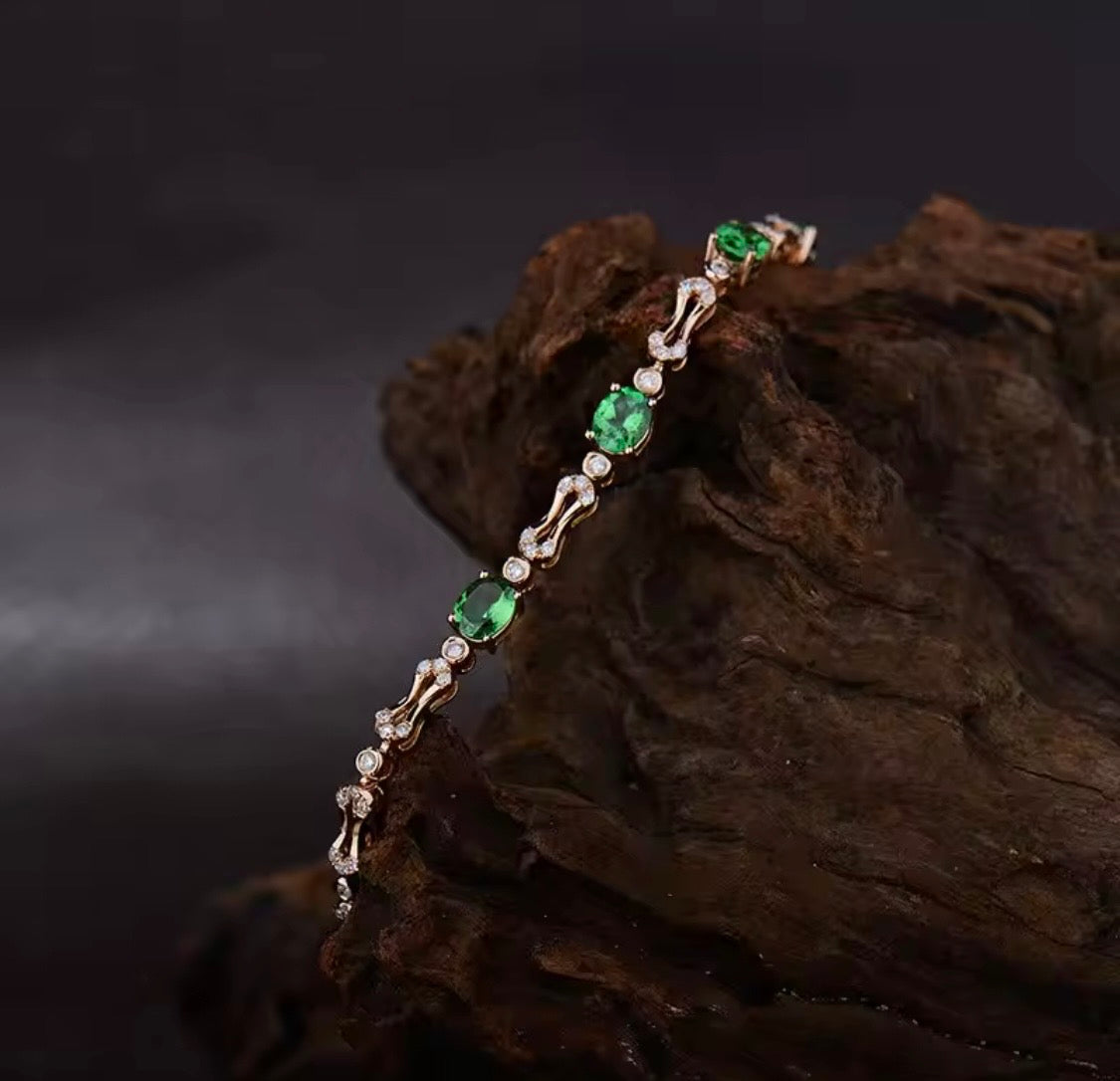 18K gold tsavorite diamond bracelet with 1.77 carat natural green tsavorite and elegant link design